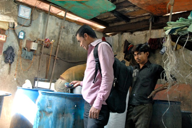 mohammed in a workshop in dharavi